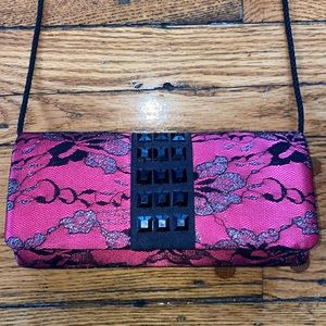 Pink and black handbag